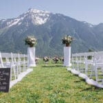 Outdoor event in the countryside with mountain background