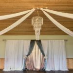 10-Fraser River lodge- backdrop/ceiling drapes and chandelier