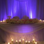 23-backdrop with beaded curtains and table drapes