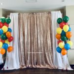 42-clubhouse - rose gold backdrop w/balloons